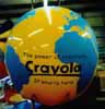 Globe helium balloon with Crayola logo.